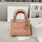 Dior mini handbag in light pink quilted leather with top handles and gold-tone hardware