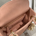 Dior mini handbag interior pocket with zipper and gold-tone hardware, light pink leather