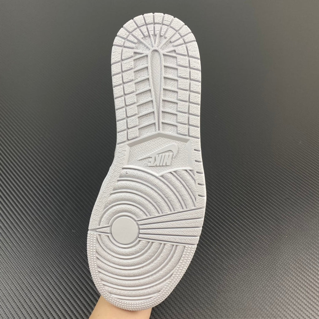 Air Jordan 1 low OG sneakers outsole with textured tread and circular traction pattern
