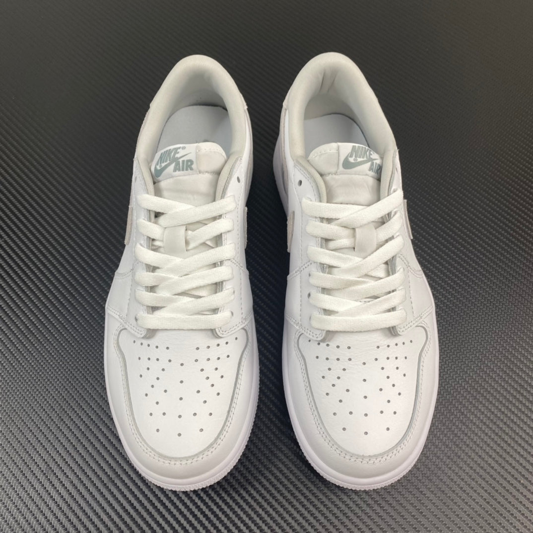 Air Jordan 1 low OG sneakers pair, white leather uppers with lace-up front