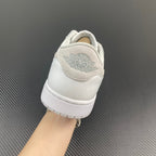 Air Jordan 1 low OG sneakers, heel view with Nike Air logo on white upper