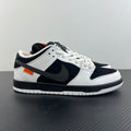 Black and white low-top sneakers with lace-up design and black Nike swoosh
