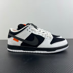 Black and white low-top sneakers with lace-up design and black Nike swoosh