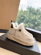 Amiri high-top lace-up boots in light beige suede with faux fur trim and rubber sole