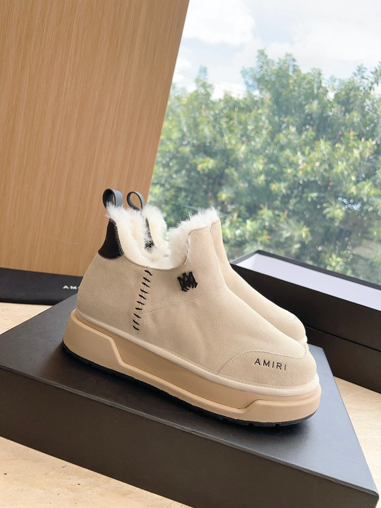 Amiri high-top lace-up boots in light beige suede with faux fur trim and rubber sole