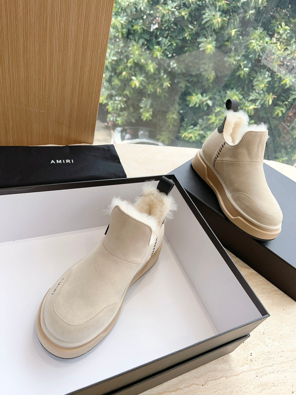 Amiri lace-up ankle boots in light beige suede with faux fur collar and side stitch detail