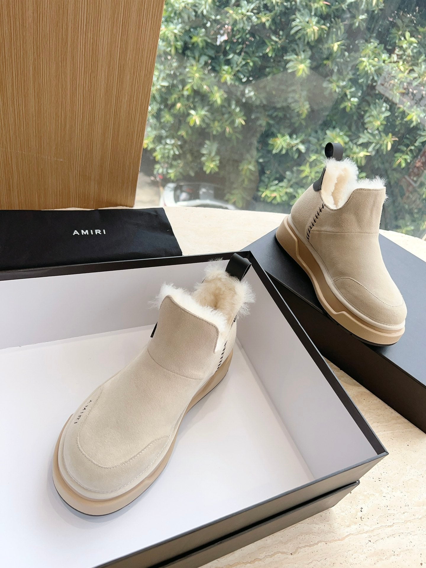 Amiri lace-up ankle boots in light beige suede with faux fur collar and side stitch detail