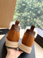 Amiri tan suede ankle boots with white shearling collars, heel view