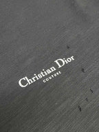 Christian Dior logo print on dark textured T-shirt fabric