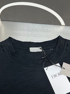 Christian Dior T-shirt neckline detail with size tag and hanging white label