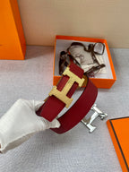 Red leather belt with gold-tone H buckle, shown in a gift box