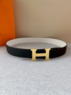 Black leather belt with gold-tone H buckle and smooth end strap