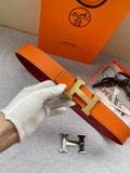 Orange leather belt with gold H buckle