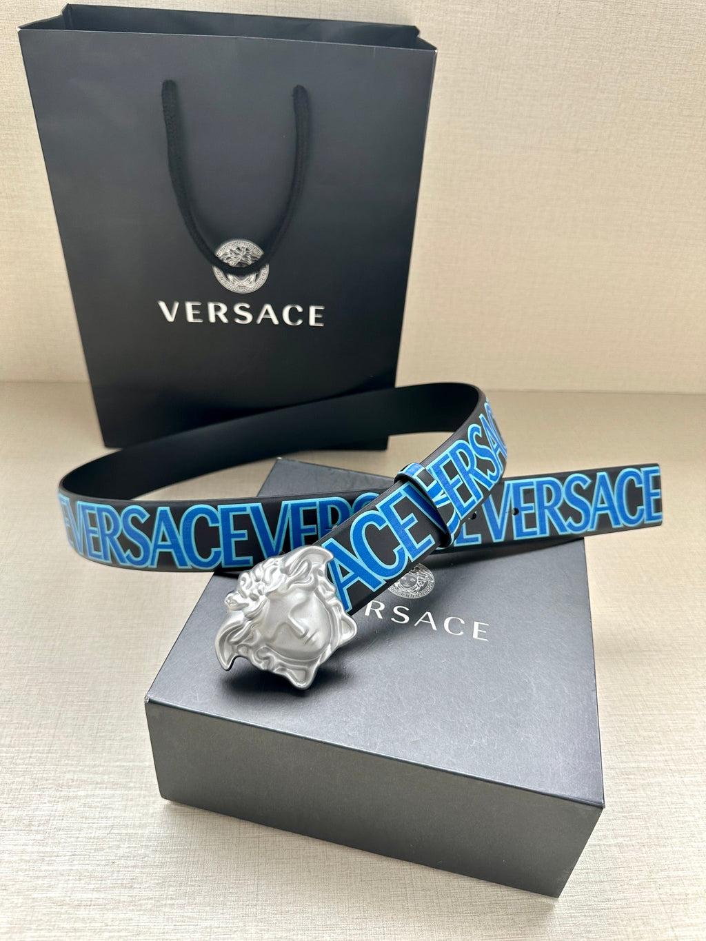 Versace belt with blue logo webbing strap and silver Medusa head buckle