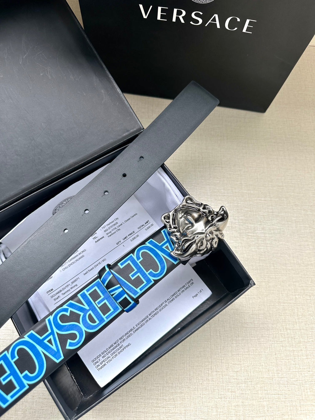 Versace belt in box: blue logo perforated strap with silver Medusa buckle