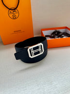 Navy leather belt with wide strap and silver square buckle