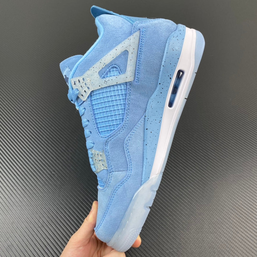 Light blue Air Jordan 4 sneaker outsole side view with strap near heel