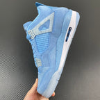 Light blue Air Jordan 4 sneaker outsole side view with strap near heel