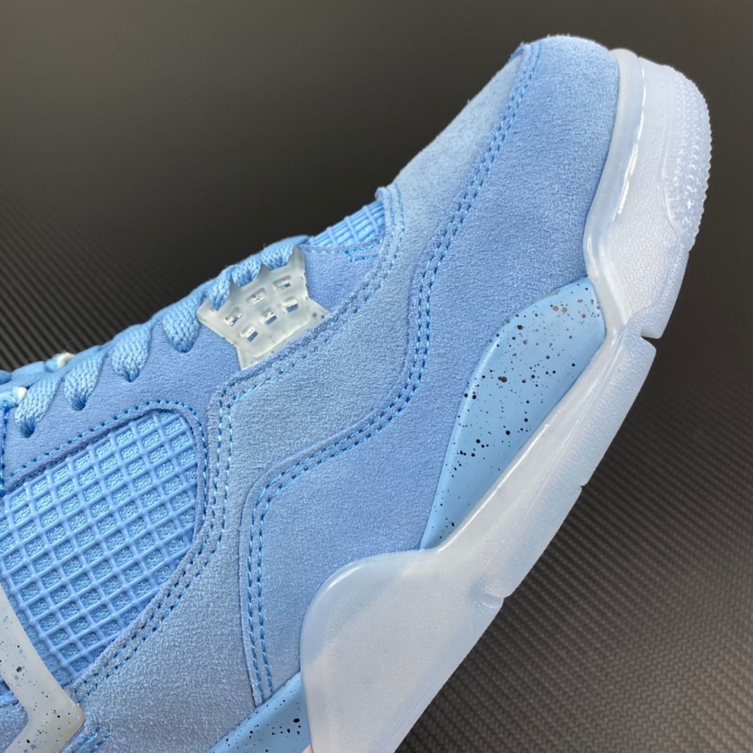 Light blue Air Jordan 4 sneaker close-up of suede panels and lace area