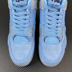 Light blue Air Jordan 4 sneaker close-up of laces and textured toe panel