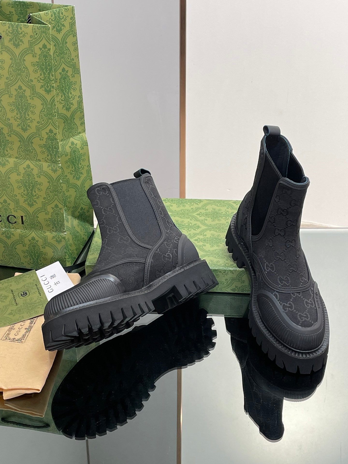 Gucci unisex Chelsea boots in gray and dark, side gore, chunky tread soles