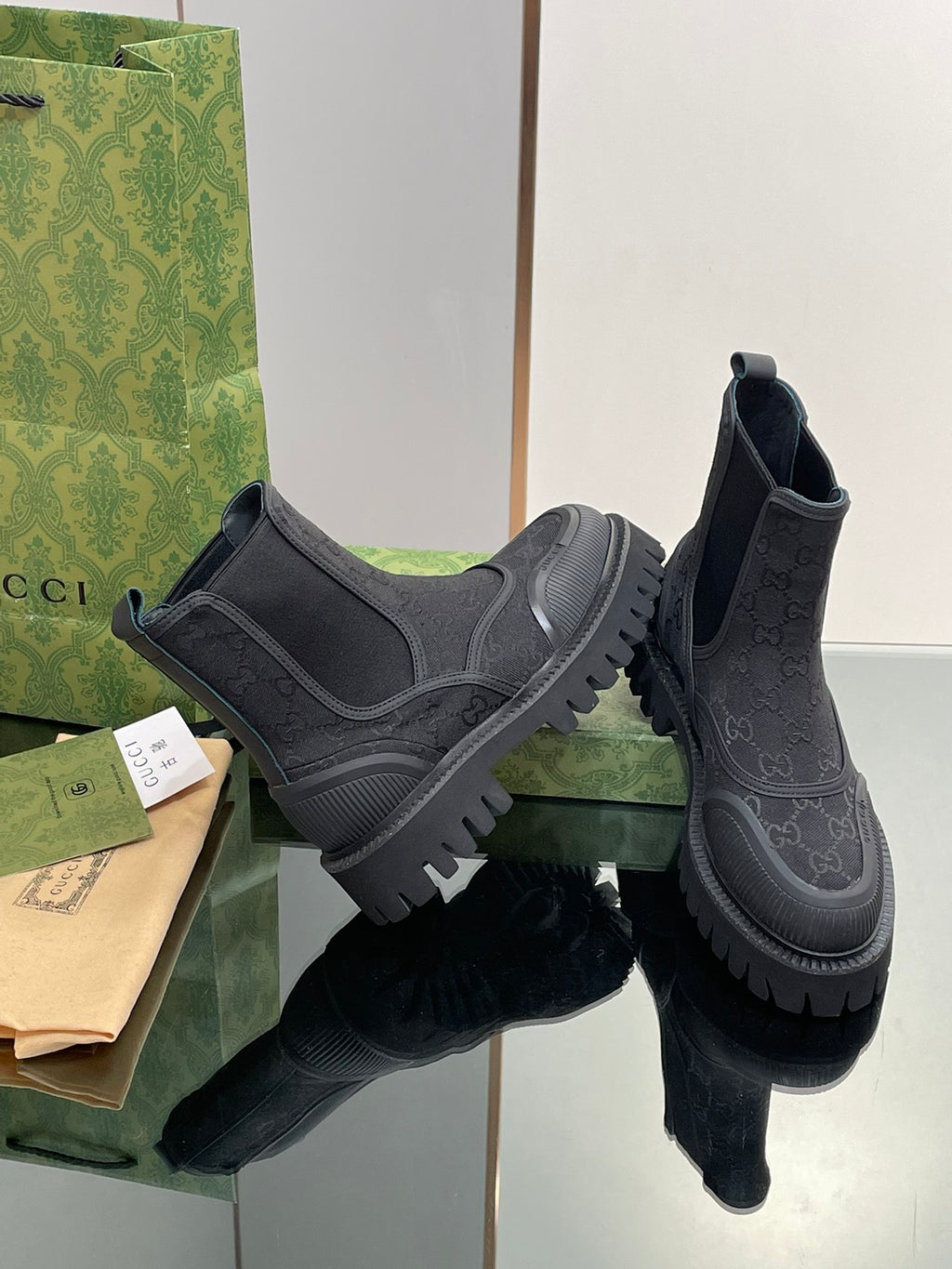 Gucci unisex Chelsea boots, dark elastic gore, embossed pattern, thick platform tread sole