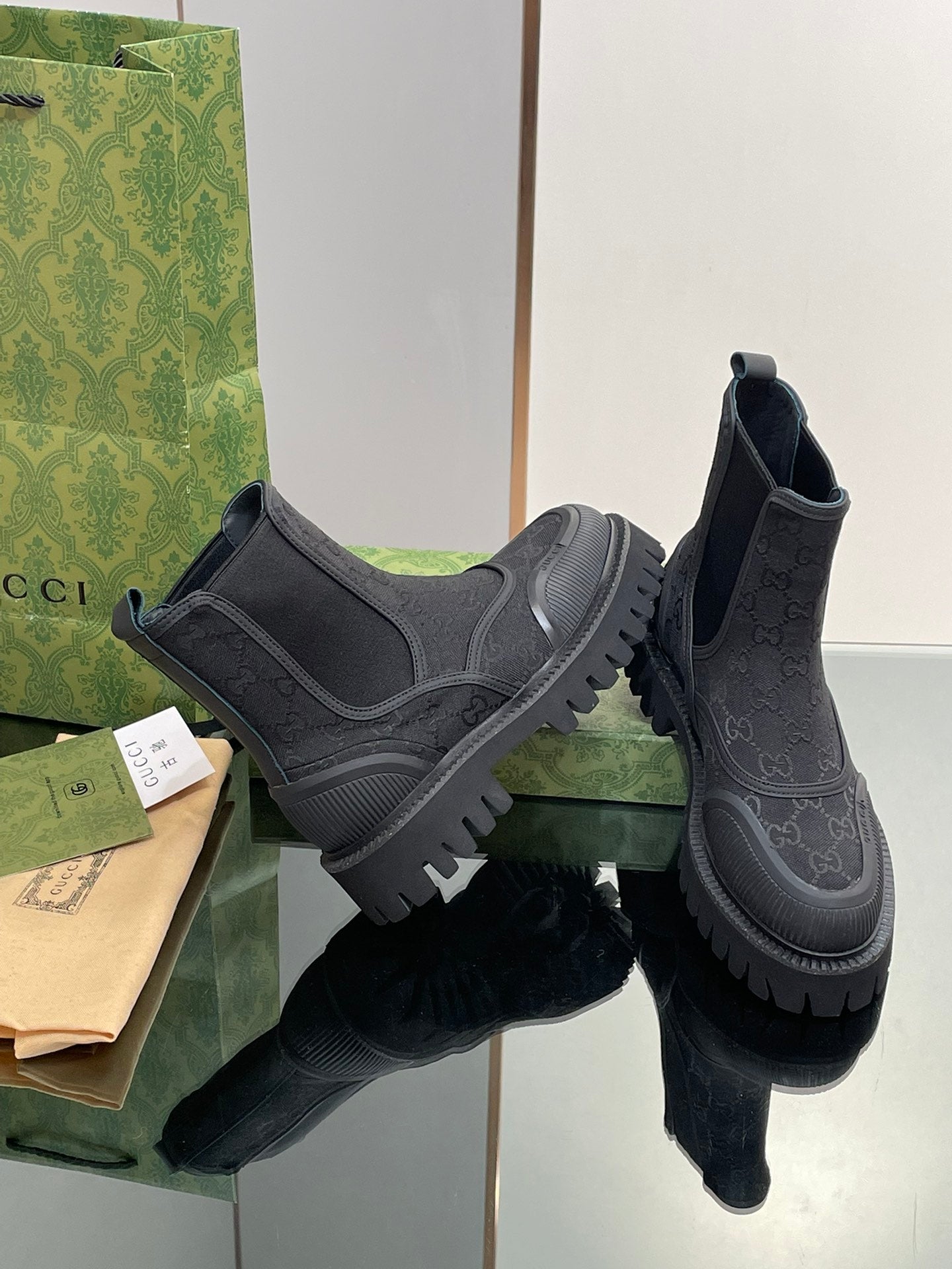 Gucci unisex Chelsea boots, dark elastic gore, embossed pattern, thick platform tread sole