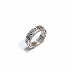 Chrome ring with engraved decorative band, polished silver tone