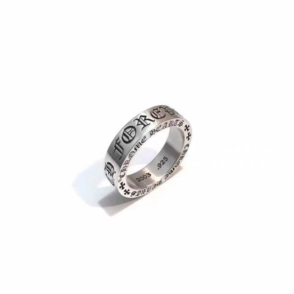 Chrome ring with engraved decorative band, polished silver tone