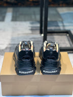 Burberry sneakers back view on box, logo on heel