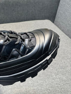 Burberry black sneaker toe and side detail with rubber sole and stitching