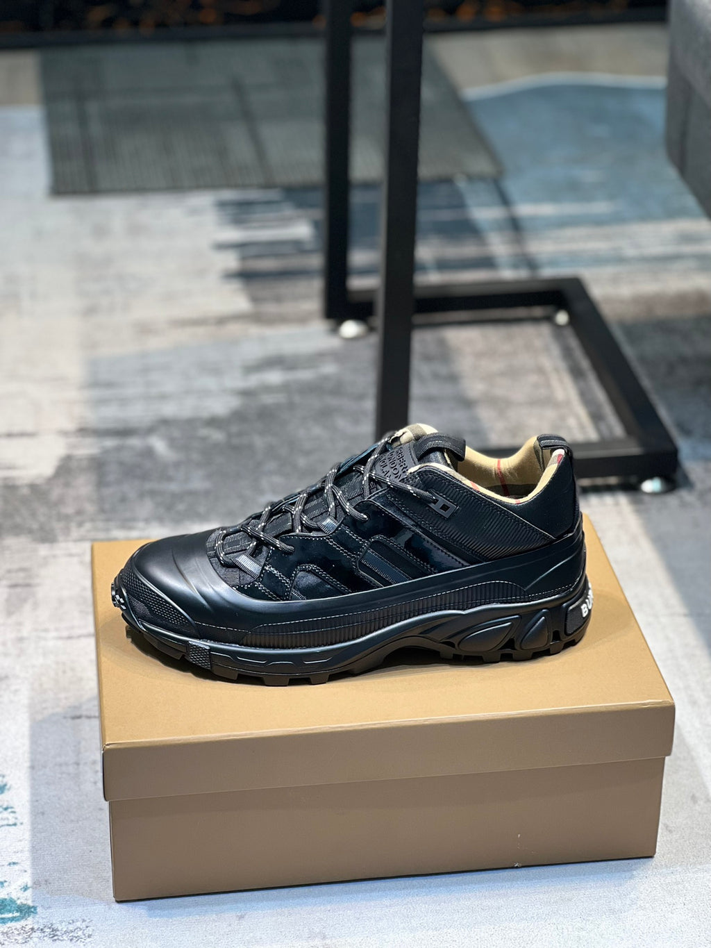 Burberry black mesh sneakers with lace-up front and chunky rubber sole