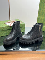 Gucci unisex ankle boots in dark black with lace-up front, side zip, chunky tread