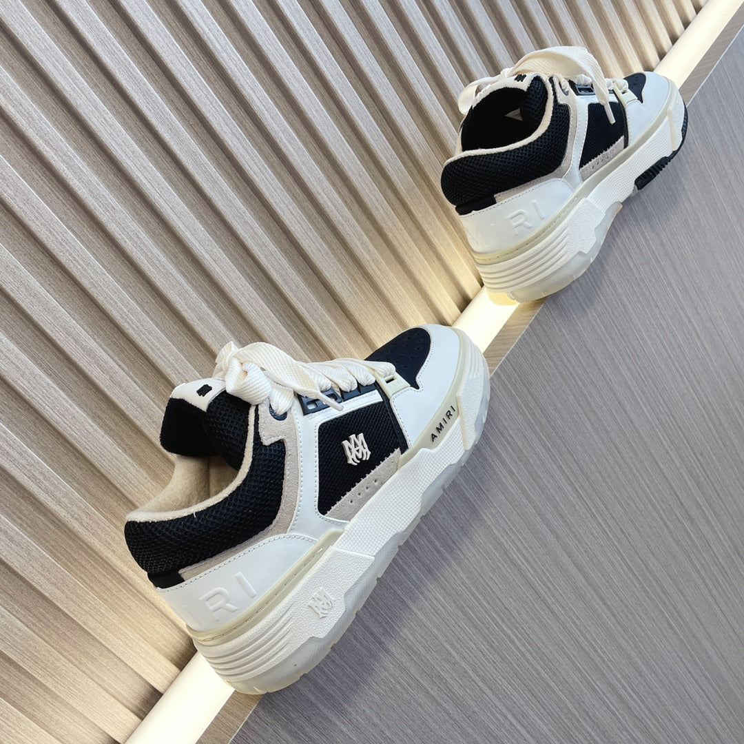 Amiri low-top sneakers with white and black color-block, lace-up, side logo detail