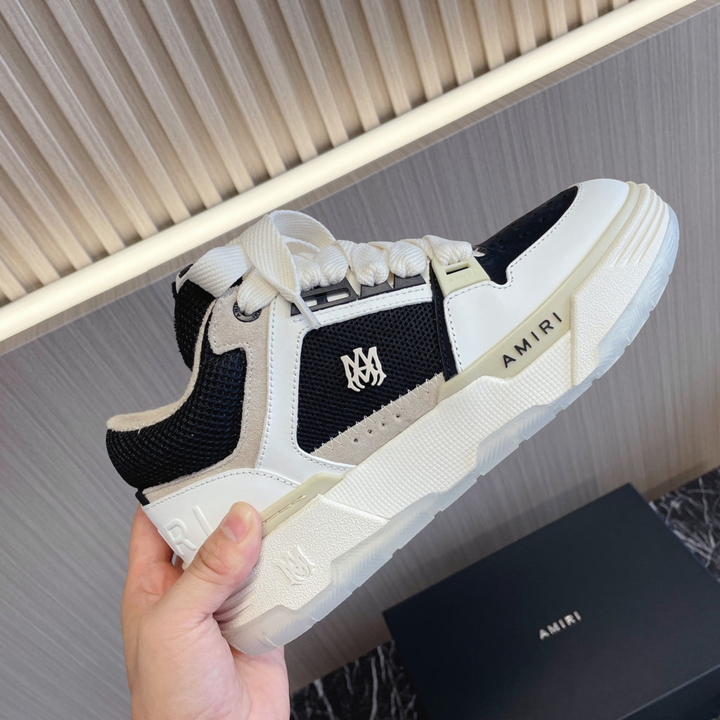 Amiri low-top sneakers, white and black with textured panels, lace-up, side AMIRI logo