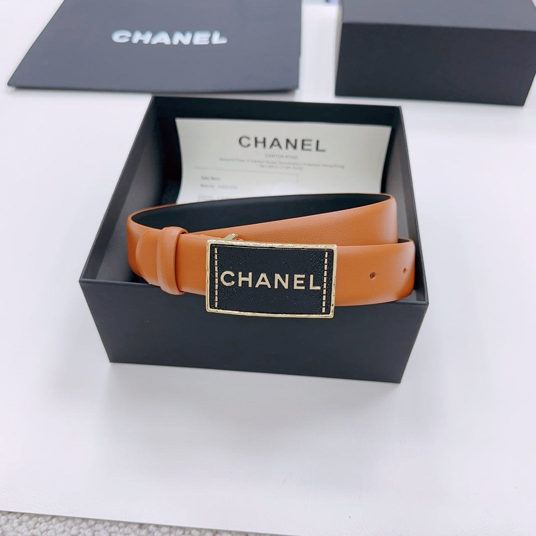 Chanel belt with tan leather strap and dark gold logo buckle in gift box