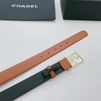 Chanel belt pair displayed: tan strap and dark green strap with logo buckle
