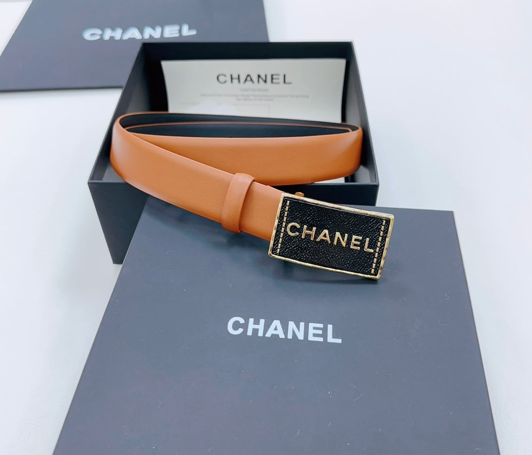 Chanel belt in box, tan leather strap with dark gold square logo buckle
