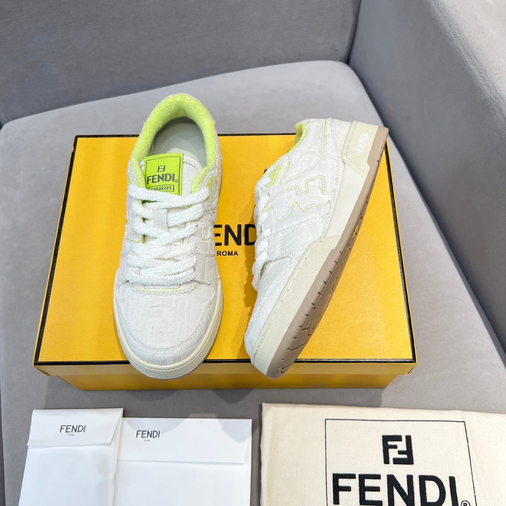 White unisex sneakers pair on box; neon green tongues and lace-ups