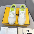 Front view of white unisex sneakers with neon green collars and lace-up design