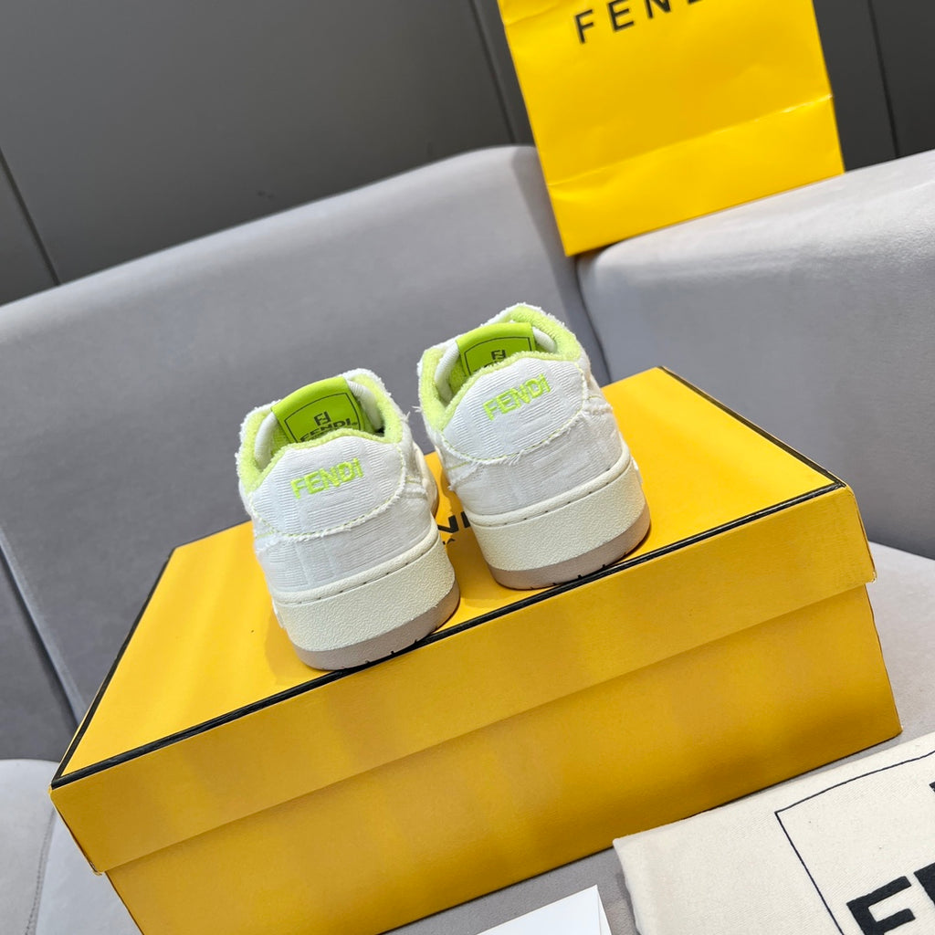 Back view of white unisex sneakers with neon green heel tabs and lace-up front