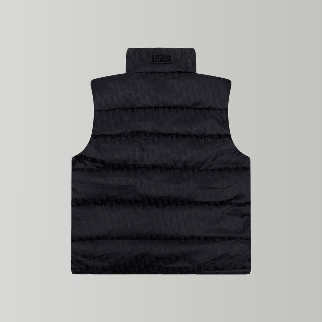 Black hooded puffer vest, rear view with horizontal quilting