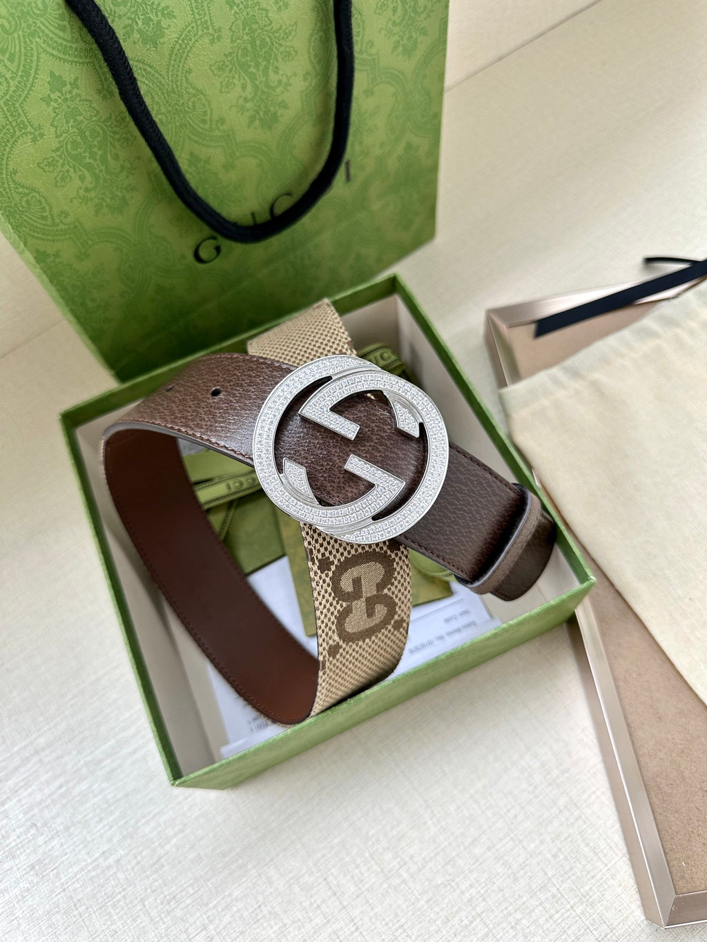Gucci belt in gift box with brown leather strap and rhinestone circular G buckle