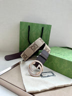 Gucci belt with brown leather strap and circular G buckle set with rhinestones
