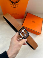 Tan leather belt with silver square H buckle and stitched edges