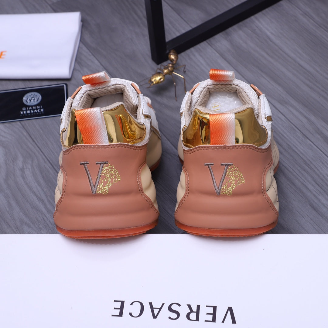 Versace sneakers back view: peach-beige leather heel with gold V logo, orange tabs