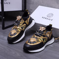 Versace luxury shoes, black sneakers with gold baroque print, Medusa badge, chain laces