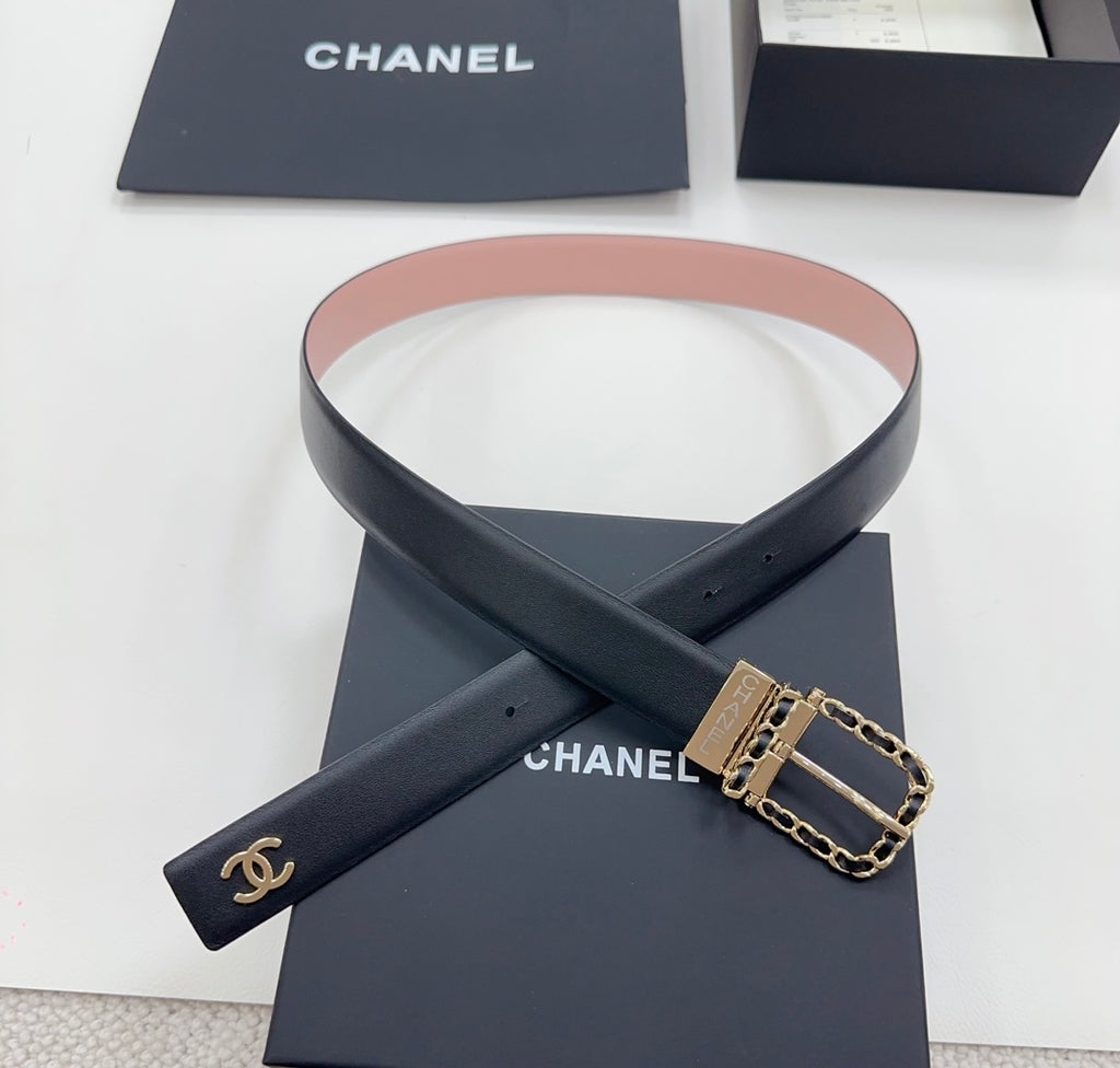 Chanel belt with dark leather strap, Chanel logo, gold buckle with chain-link detail.