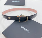Chanel belt with dark strap and pink top edge, gold buckle and chain-link hardware.