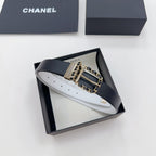 Chanel leather belt in dark blue with gold-tone CC buckle and chain detail